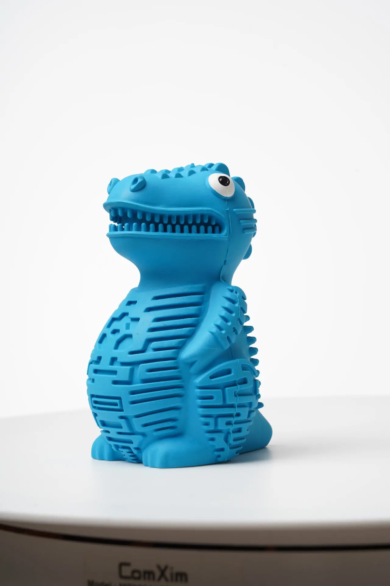 DinoTuff Rugged Dental Chew - The <strong>DinoTuff Rugged Dental Chew</strong> is an eco-friendly, durable natural rubber toy designed to promote your pet’s dental health while providing entertainment. Its <strong>teething texture</strong> cleans teeth during play, with a recess for applying toothpaste, and it also doubles as a <strong>puzzle treat dispenser</strong> to engage your pet’s mind. Made from non-toxic, bite-resistant materials, it’s ideal for heavy chewers and supports sustainability. The chew toy helps reduce plaque, promotes healthy gums, and provides hours of fun, all while being easy to clean and customizable. - dinotuff-dent-01 DinoTuff Rugged Dental Chew - Image 12