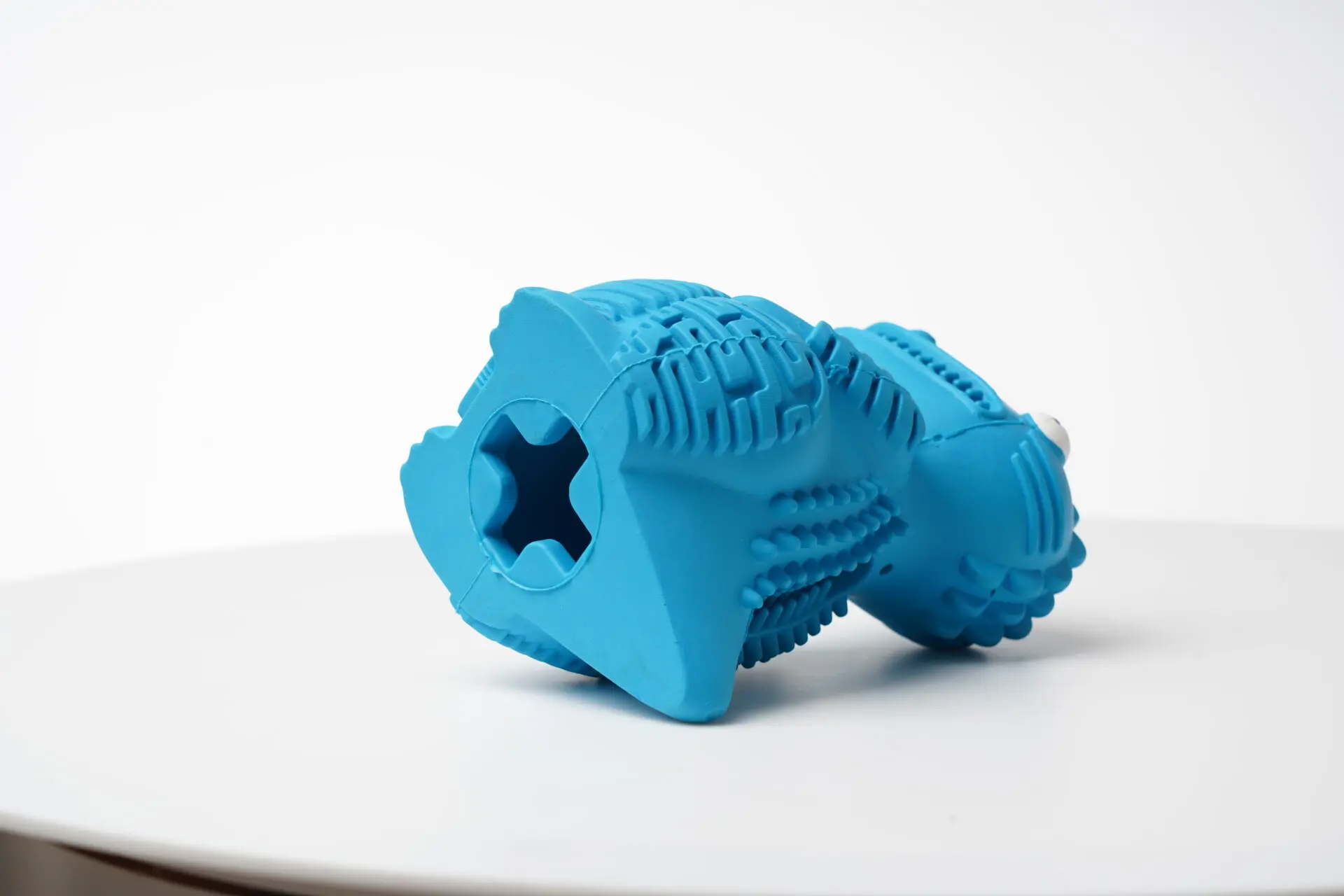 DinoTuff Rugged Dental Chew - The <strong>DinoTuff Rugged Dental Chew</strong> is an eco-friendly, durable natural rubber toy designed to promote your pet’s dental health while providing entertainment. Its <strong>teething texture</strong> cleans teeth during play, with a recess for applying toothpaste, and it also doubles as a <strong>puzzle treat dispenser</strong> to engage your pet’s mind. Made from non-toxic, bite-resistant materials, it’s ideal for heavy chewers and supports sustainability. The chew toy helps reduce plaque, promotes healthy gums, and provides hours of fun, all while being easy to clean and customizable. - dinotuff-dent-01 DinoTuff Rugged Dental Chew - Image 13