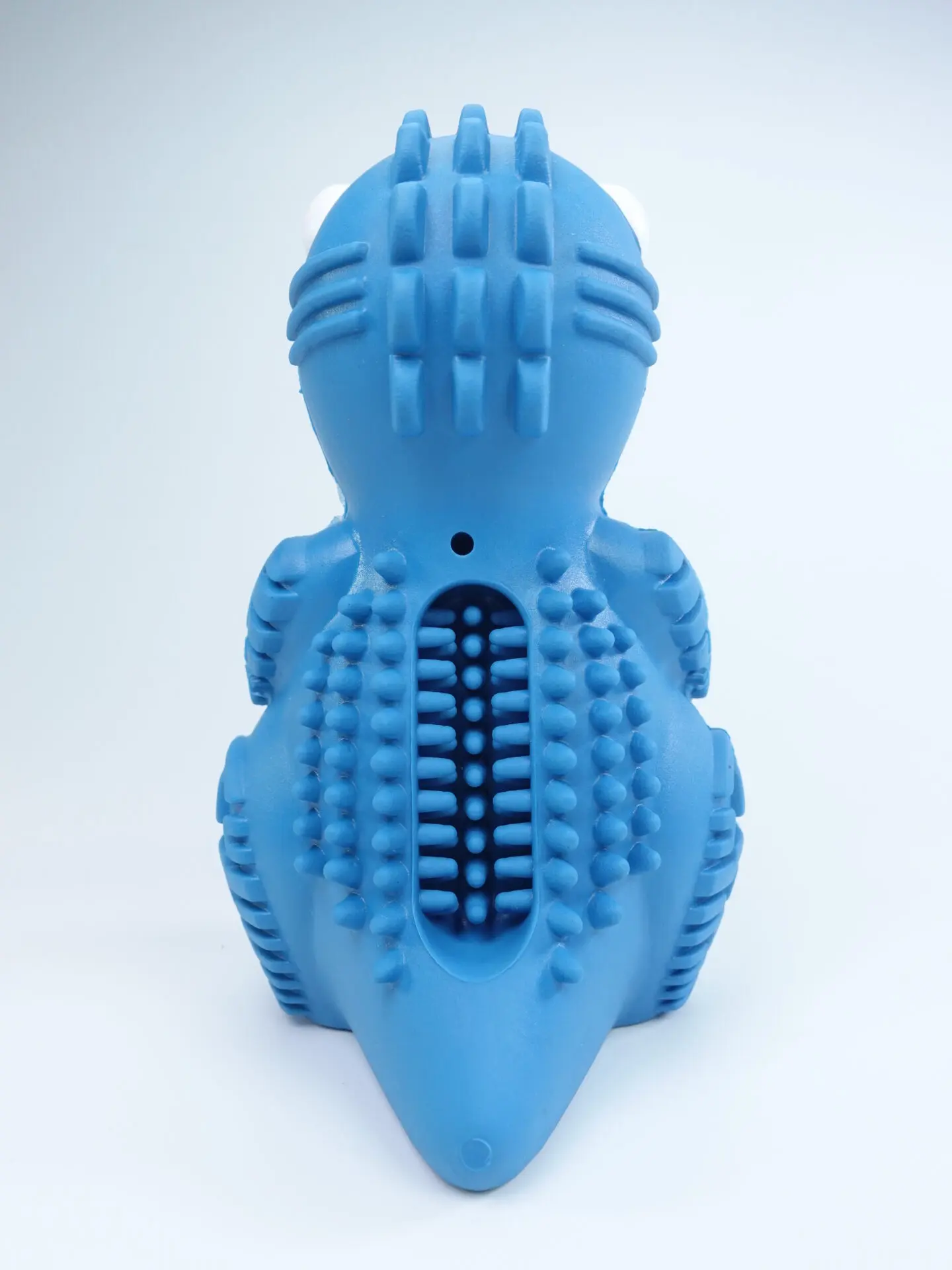 DinoTuff Rugged Dental Chew - The <strong>DinoTuff Rugged Dental Chew</strong> is an eco-friendly, durable natural rubber toy designed to promote your pet’s dental health while providing entertainment. Its <strong>teething texture</strong> cleans teeth during play, with a recess for applying toothpaste, and it also doubles as a <strong>puzzle treat dispenser</strong> to engage your pet’s mind. Made from non-toxic, bite-resistant materials, it’s ideal for heavy chewers and supports sustainability. The chew toy helps reduce plaque, promotes healthy gums, and provides hours of fun, all while being easy to clean and customizable. - dinotuff-dent-01 DinoTuff Rugged Dental Chew - Image 17