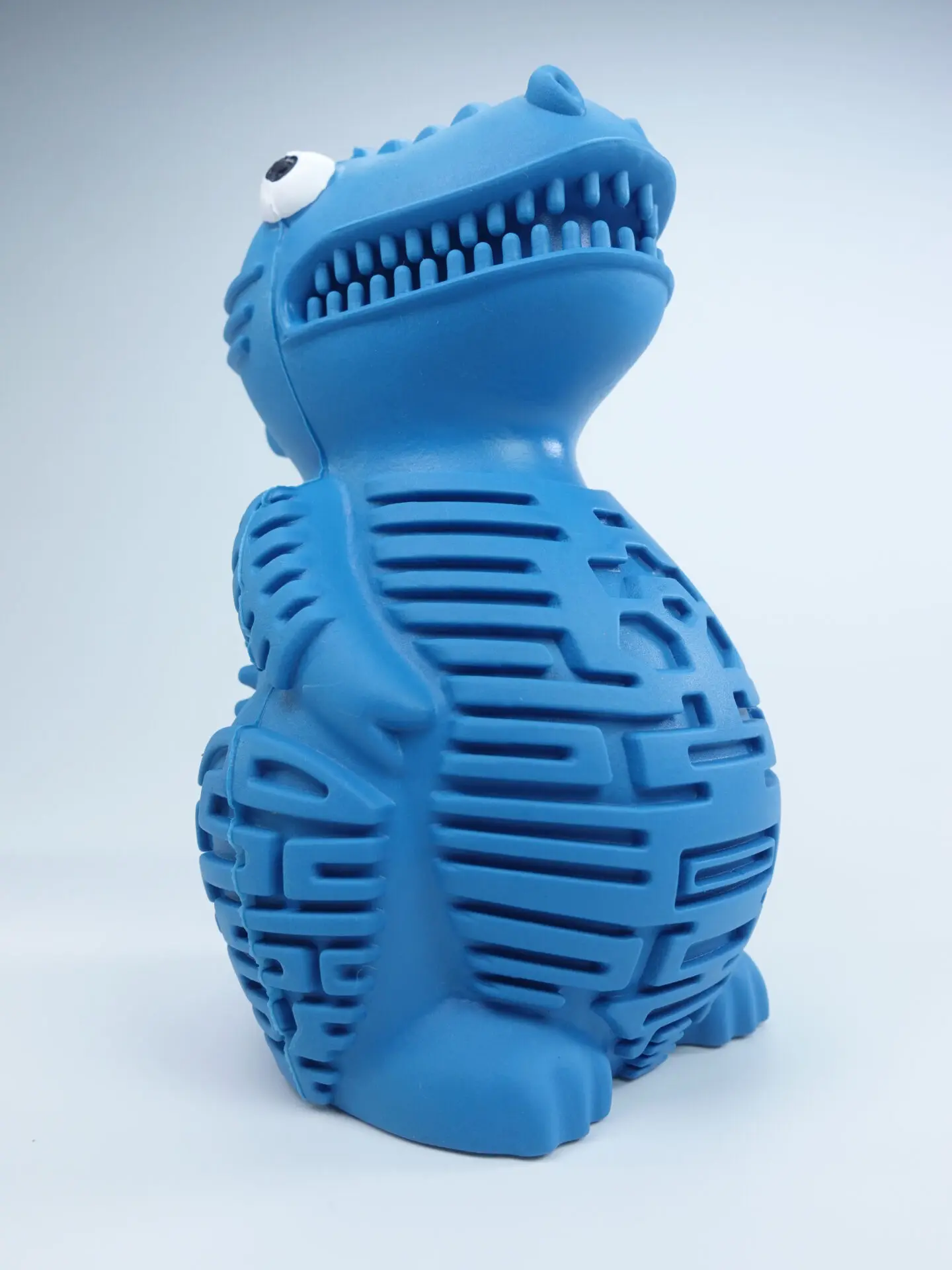 DinoTuff Rugged Dental Chew - The <strong>DinoTuff Rugged Dental Chew</strong> is an eco-friendly, durable natural rubber toy designed to promote your pet’s dental health while providing entertainment. Its <strong>teething texture</strong> cleans teeth during play, with a recess for applying toothpaste, and it also doubles as a <strong>puzzle treat dispenser</strong> to engage your pet’s mind. Made from non-toxic, bite-resistant materials, it’s ideal for heavy chewers and supports sustainability. The chew toy helps reduce plaque, promotes healthy gums, and provides hours of fun, all while being easy to clean and customizable. - dinotuff-dent-01 DinoTuff Rugged Dental Chew - Image 21