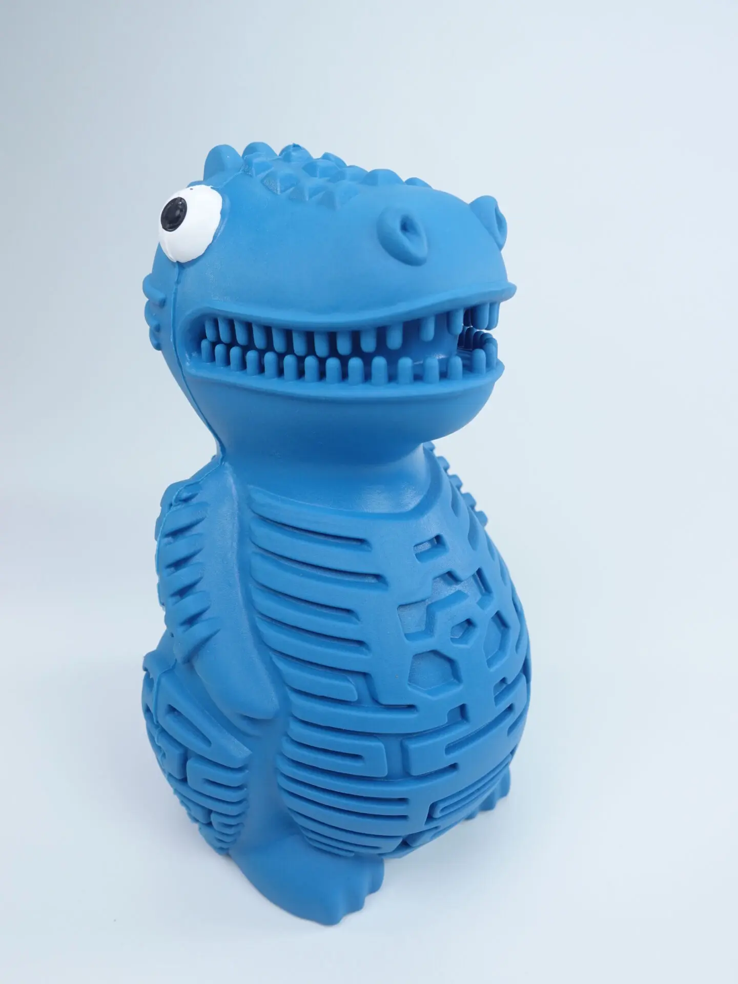 DinoTuff Rugged Dental Chew - The <strong>DinoTuff Rugged Dental Chew</strong> is an eco-friendly, durable natural rubber toy designed to promote your pet’s dental health while providing entertainment. Its <strong>teething texture</strong> cleans teeth during play, with a recess for applying toothpaste, and it also doubles as a <strong>puzzle treat dispenser</strong> to engage your pet’s mind. Made from non-toxic, bite-resistant materials, it’s ideal for heavy chewers and supports sustainability. The chew toy helps reduce plaque, promotes healthy gums, and provides hours of fun, all while being easy to clean and customizable. - dinotuff-dent-01 DinoTuff Rugged Dental Chew - Image 22